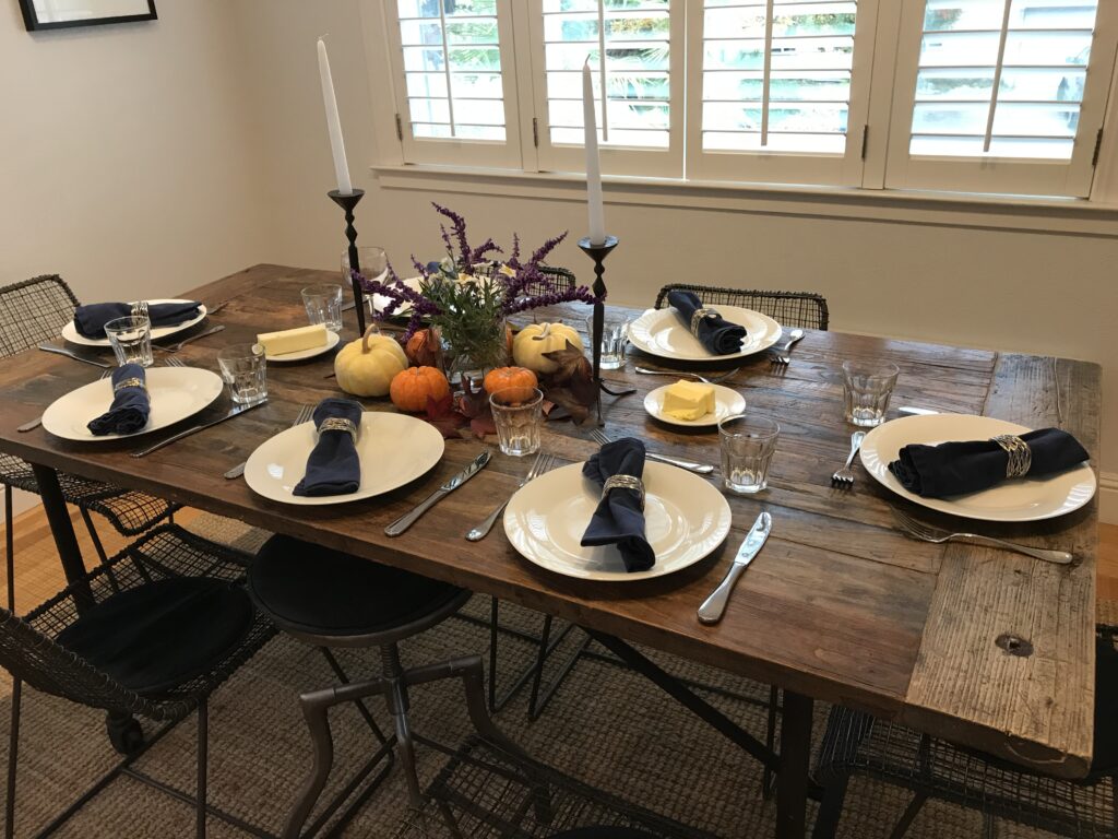 Thanksgiving table setting with six chairs